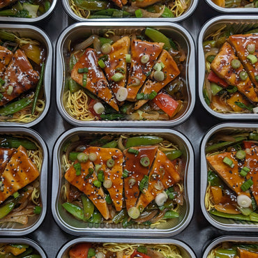 Asian marinated beef on noodles and vegetable sauté