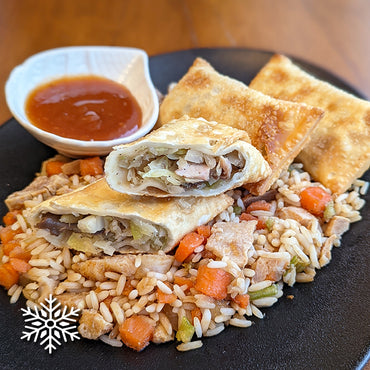 Egg rolls and fried rice with chicken