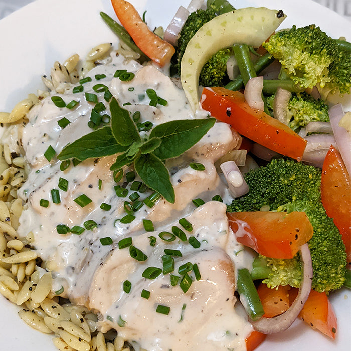 Chicken in fresh herbs creamy sauce